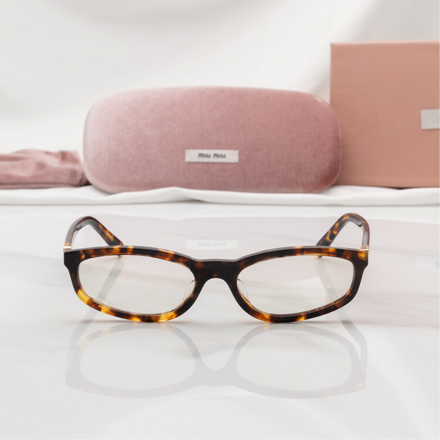 MIU MIU MU06S