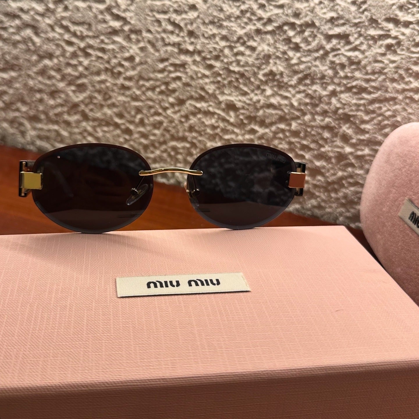 MIU MIU 70ZS